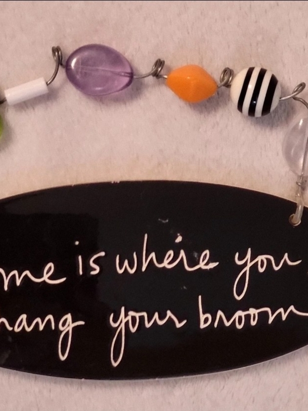 Handlettered Black Wall Plaque with Purple and Orange Beads